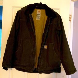 Carhartt women’s coat. Inside drawstring and waist. Detachable hood.